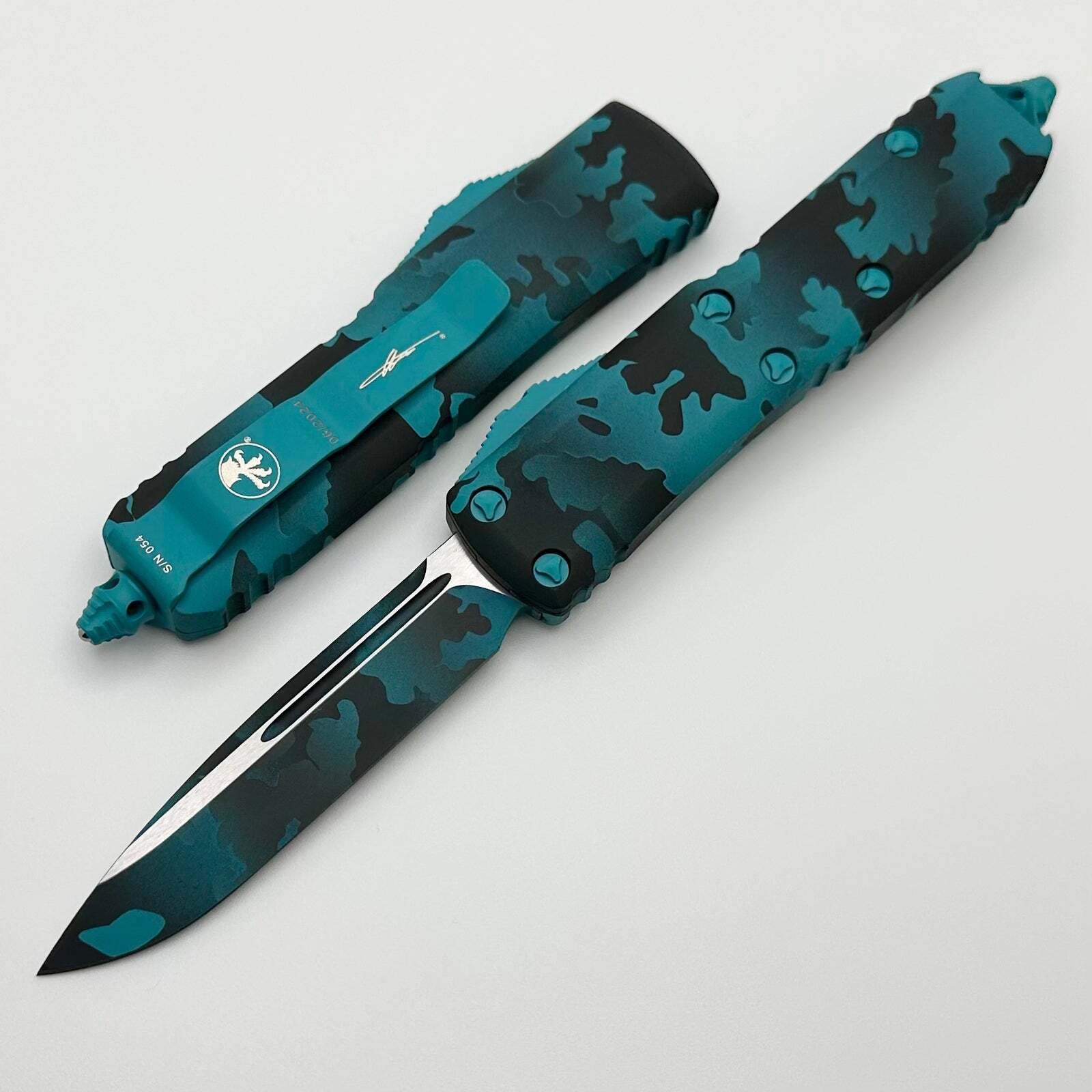 

Автоматический нож Microtech UTX-85, сталь М390, рукоять алюминий, сине-черный камуфляж