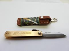 Фото Нож складной Nagao Higonokami, HKA-50BW,  сталь Aogami, жёлтый, в кожаном чехле