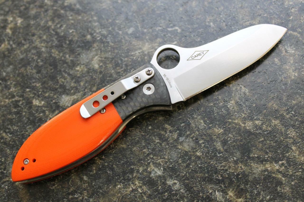 фото Нож складной peter carey design firefly™ spyderco 184gpor, сталь vg-10 satin plain, рукоять стеклотекстолит g10/карбон, оранжевый